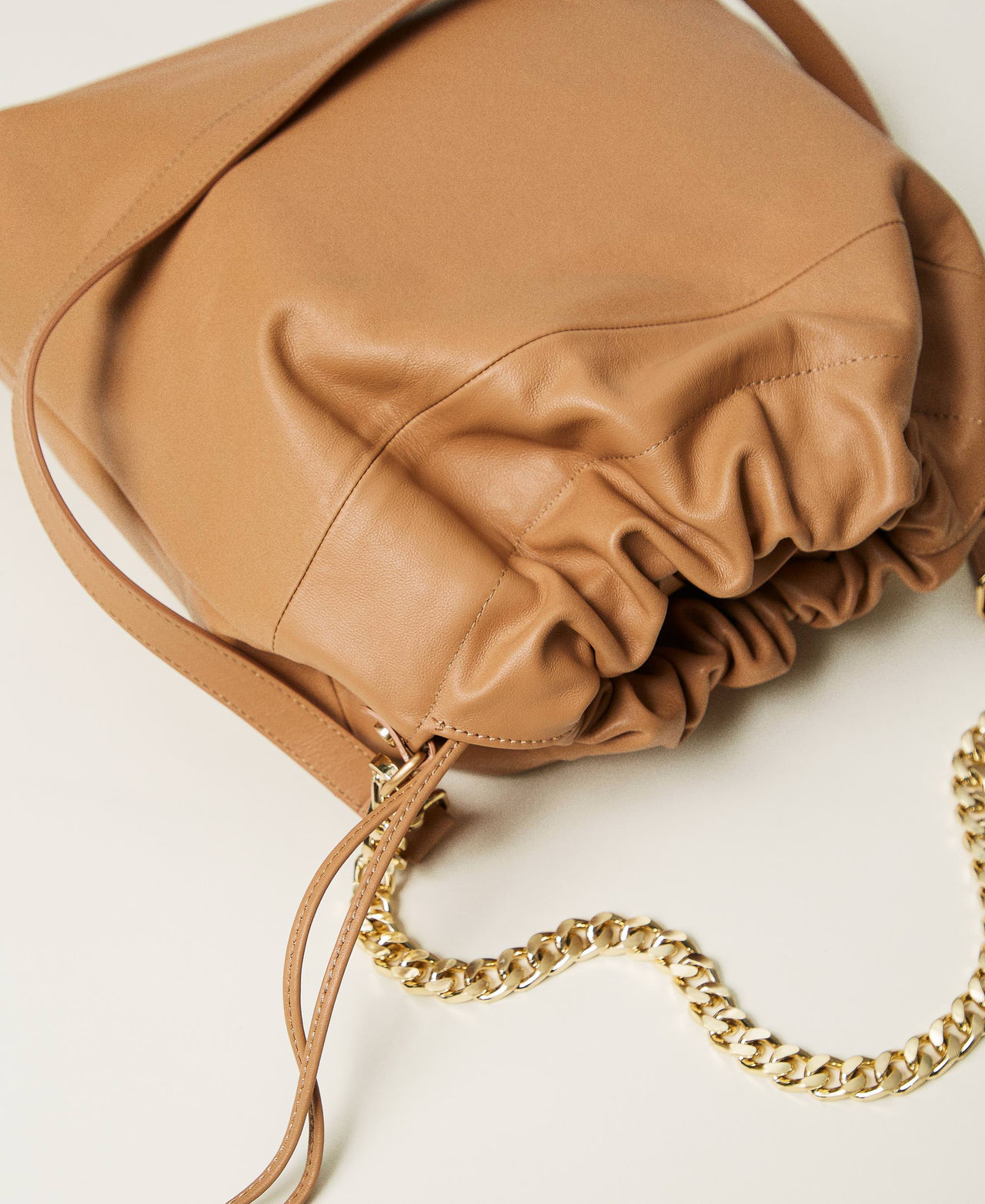 Medium leather shopper bag with drawstring