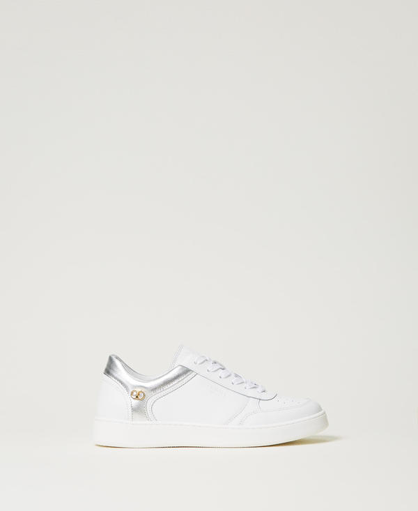 Leather trainers with laminated inserts