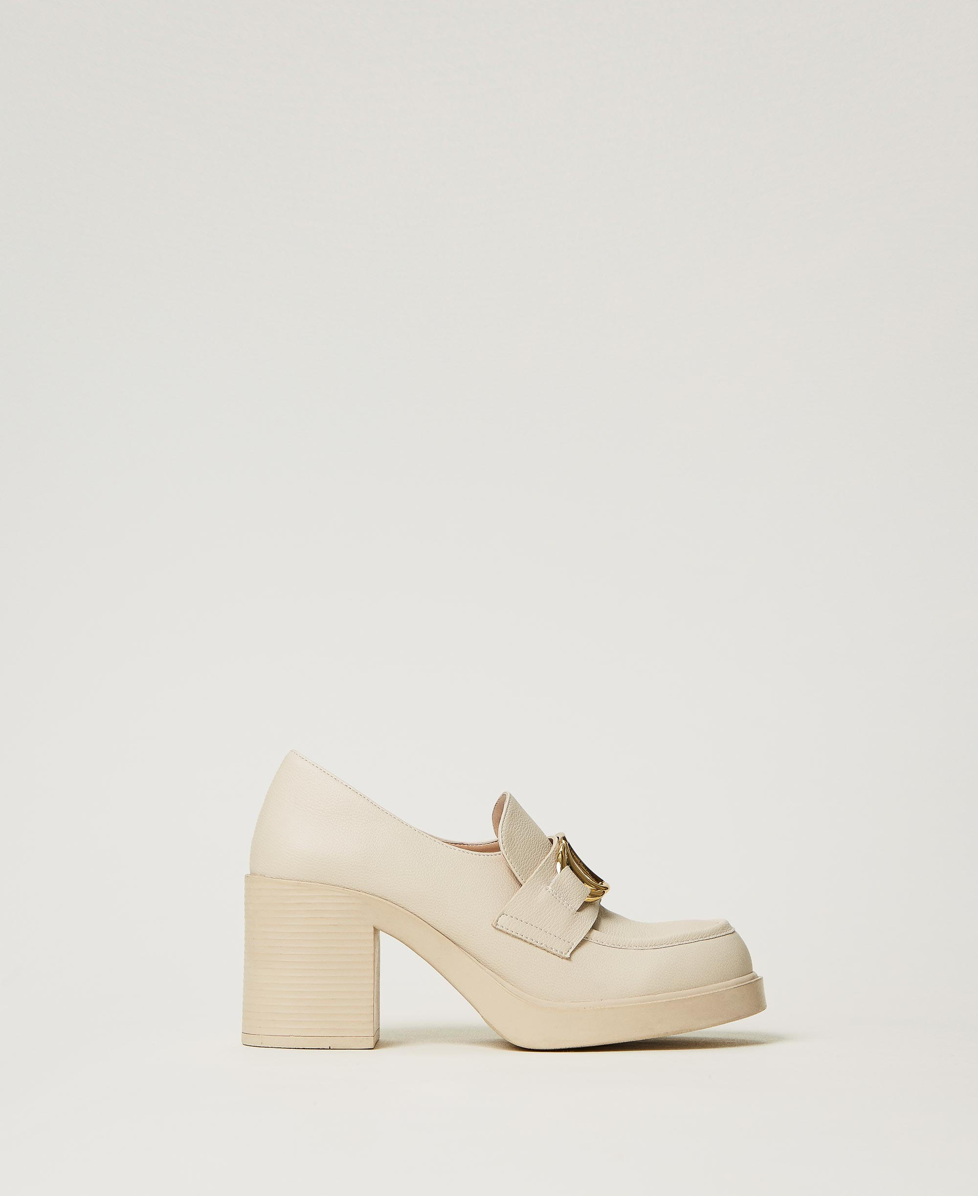 Mocassini alti con morsetto Oval T