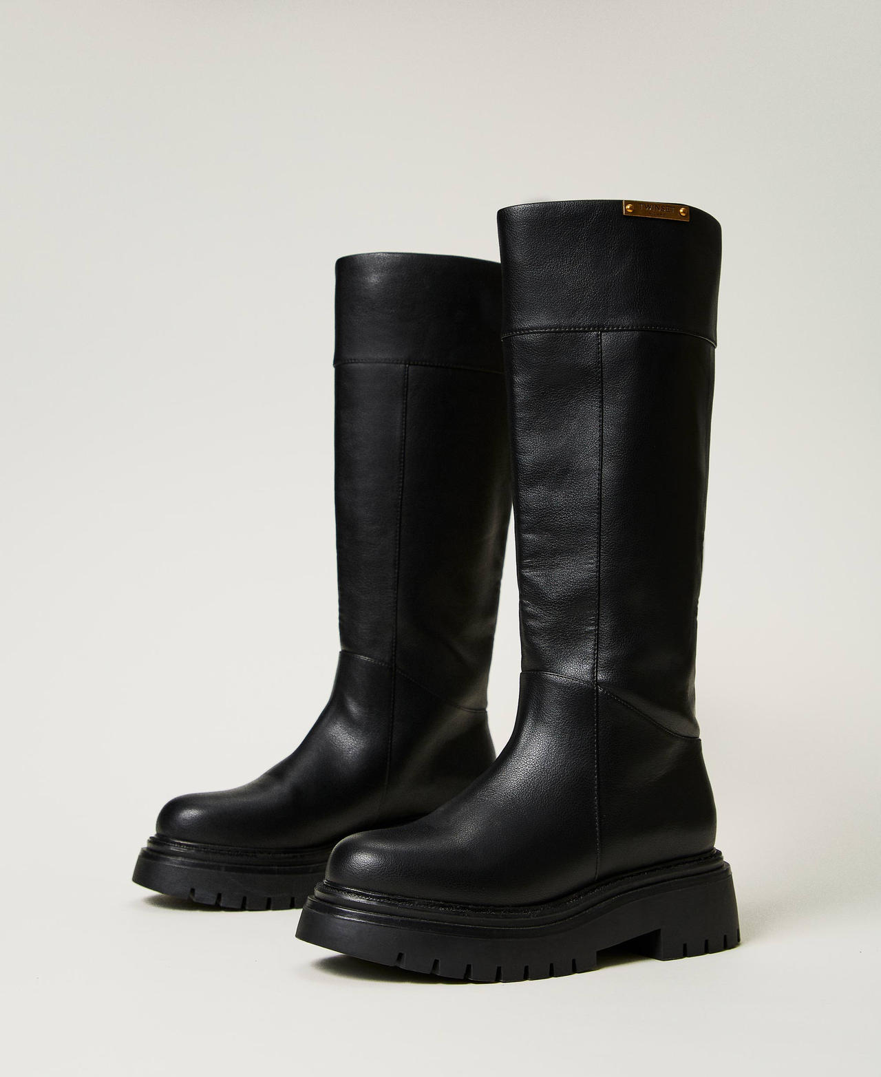 Stivali alti con targhetta logo