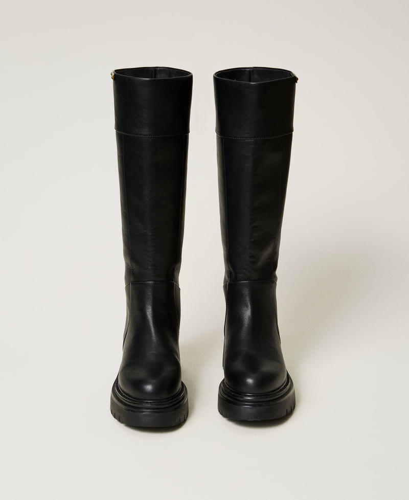 High boots with logo plate