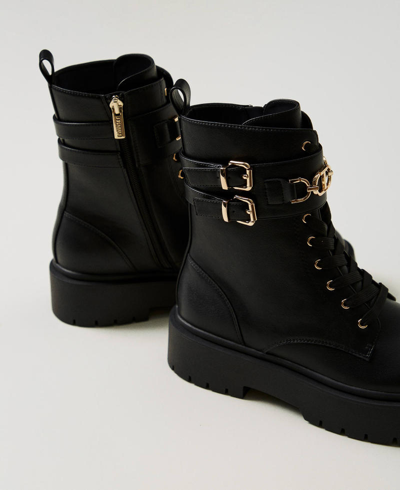 Combat boots with buckles and Oval T clasp