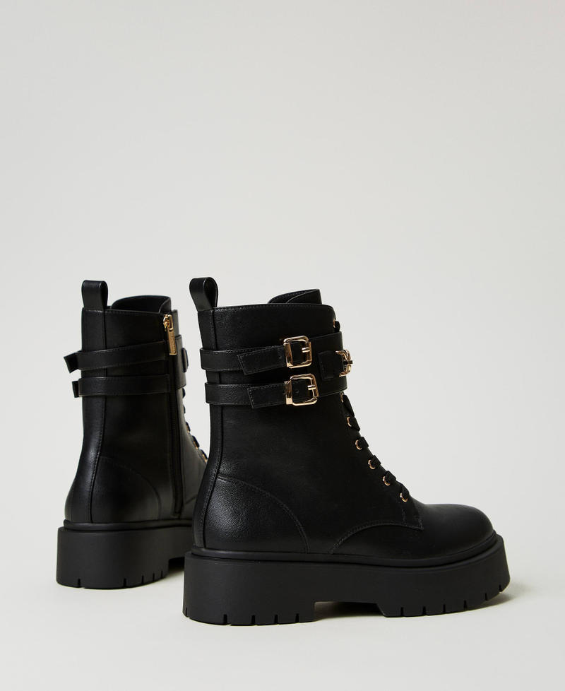 Combat boots with buckles and Oval T clasp Black Woman 242TCP062_00006_03