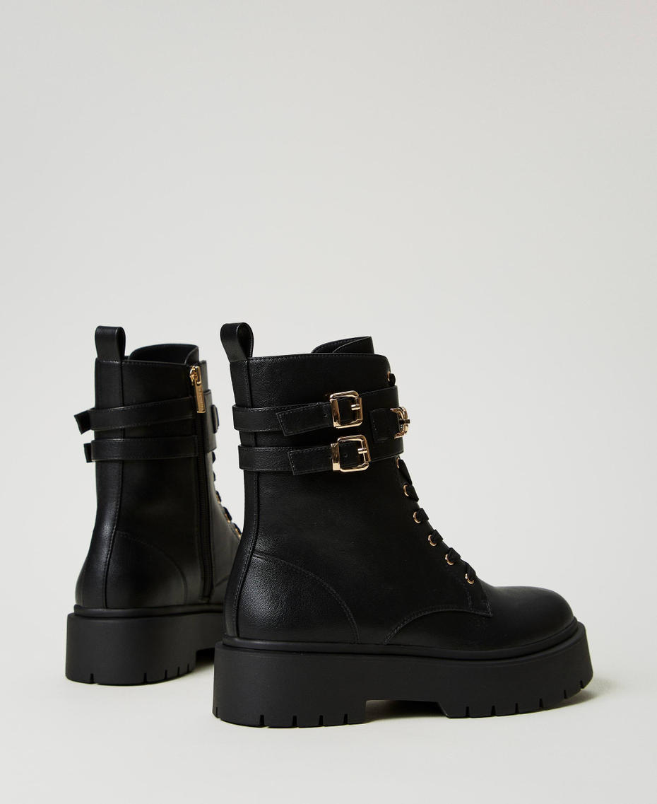 Combat boots with buckles and Oval T clasp Black Woman 242TCP062_00006_03