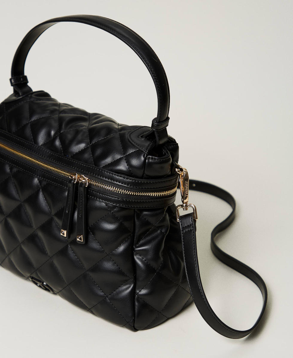 Large quilted handbag outlet