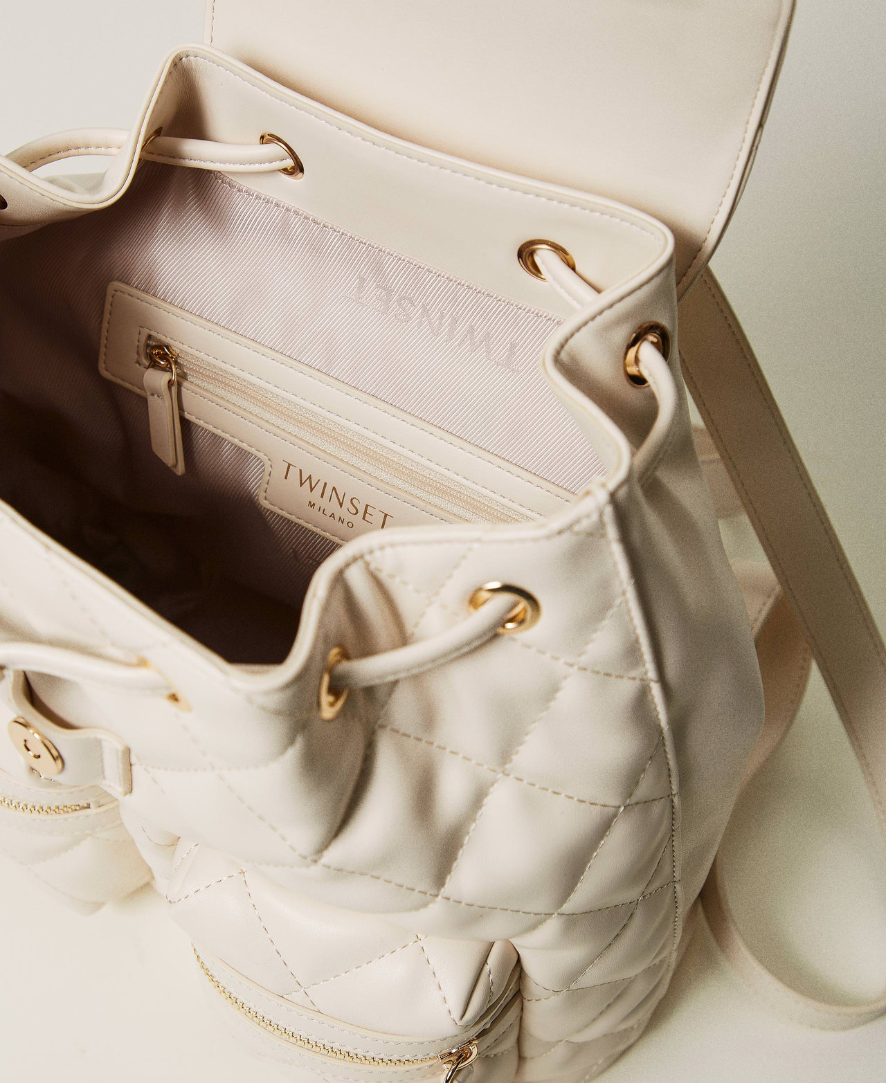 White quilted backpack top