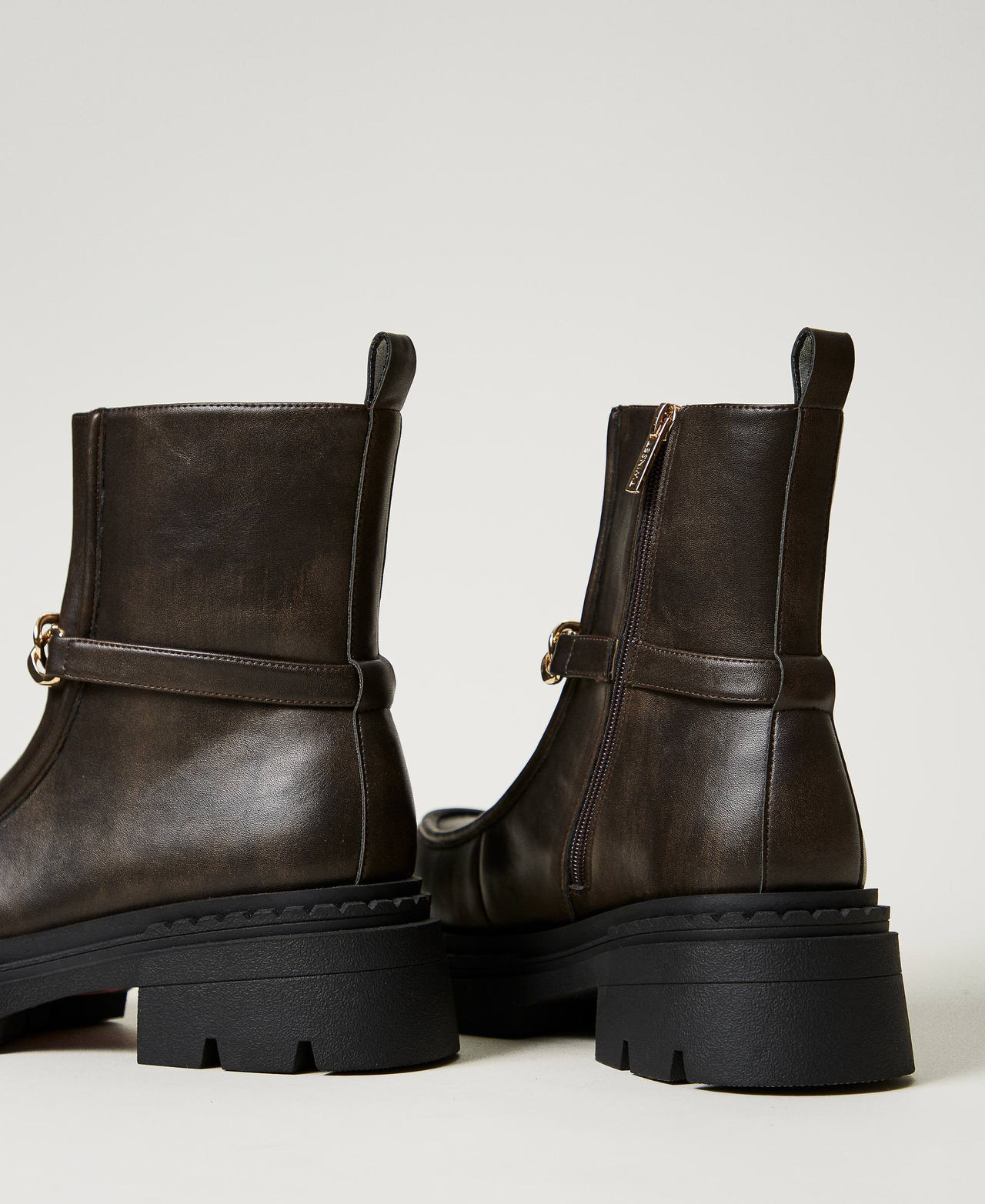 Ankle boots with Oval T clasp