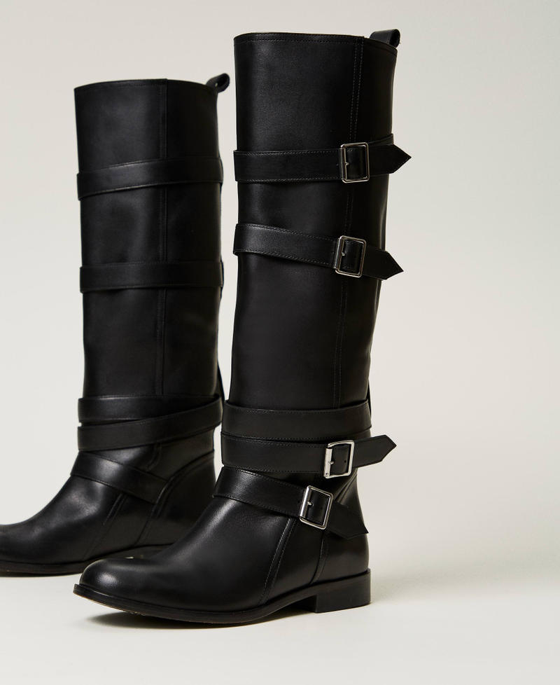 Leather boots with straps