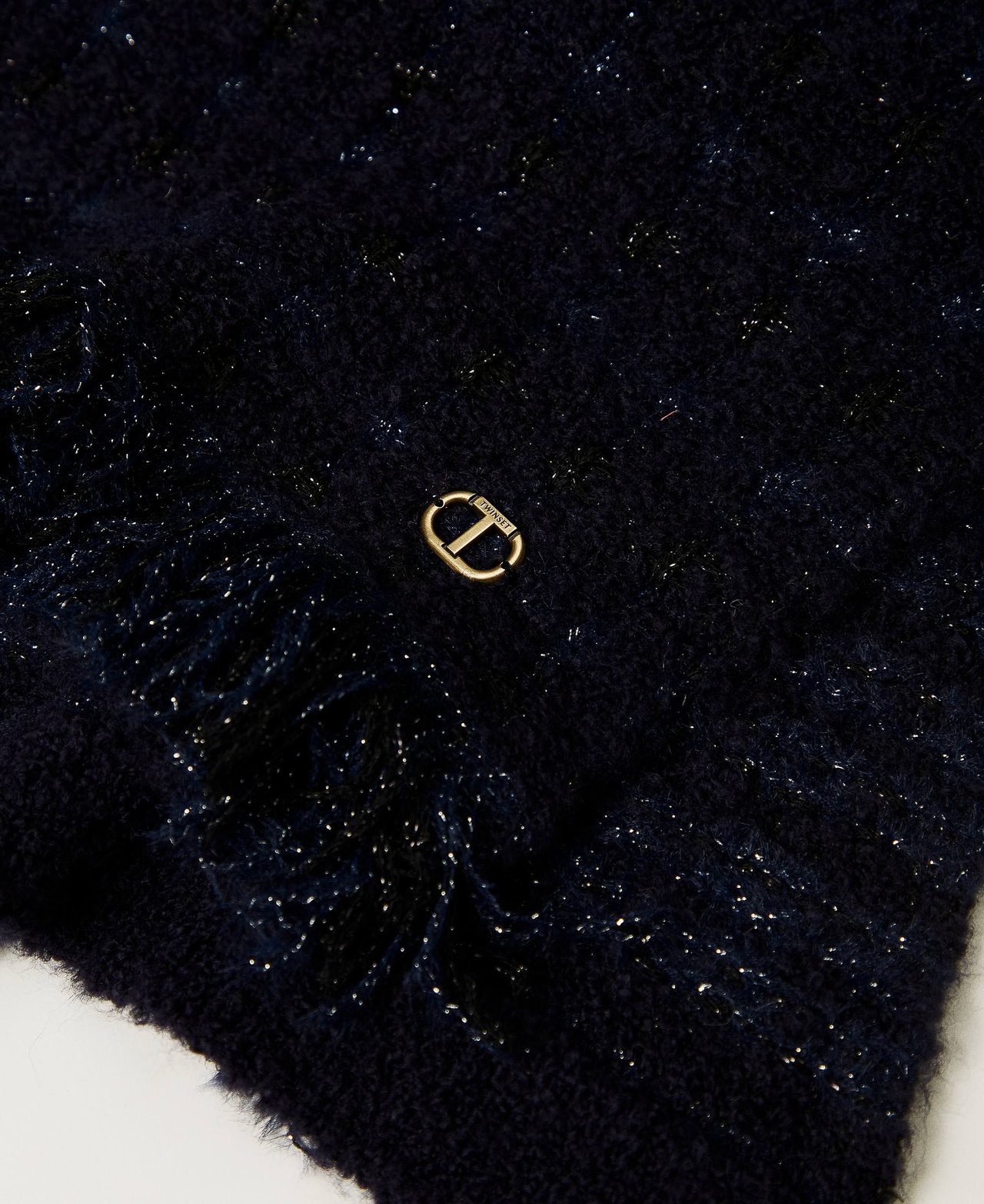 Sciarpa in maglia con lurex e frange