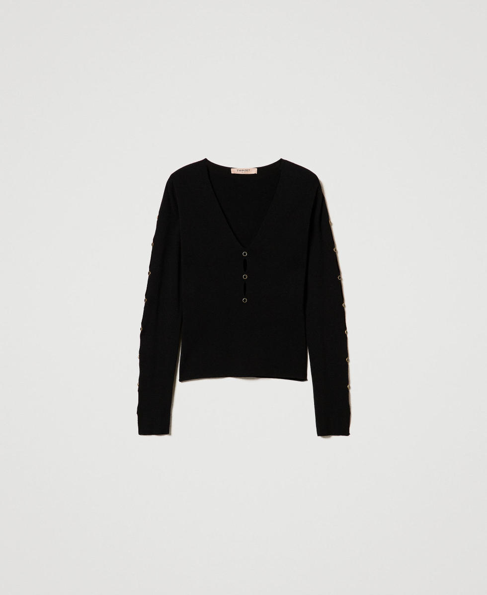 Jumper with cut-outs and studs