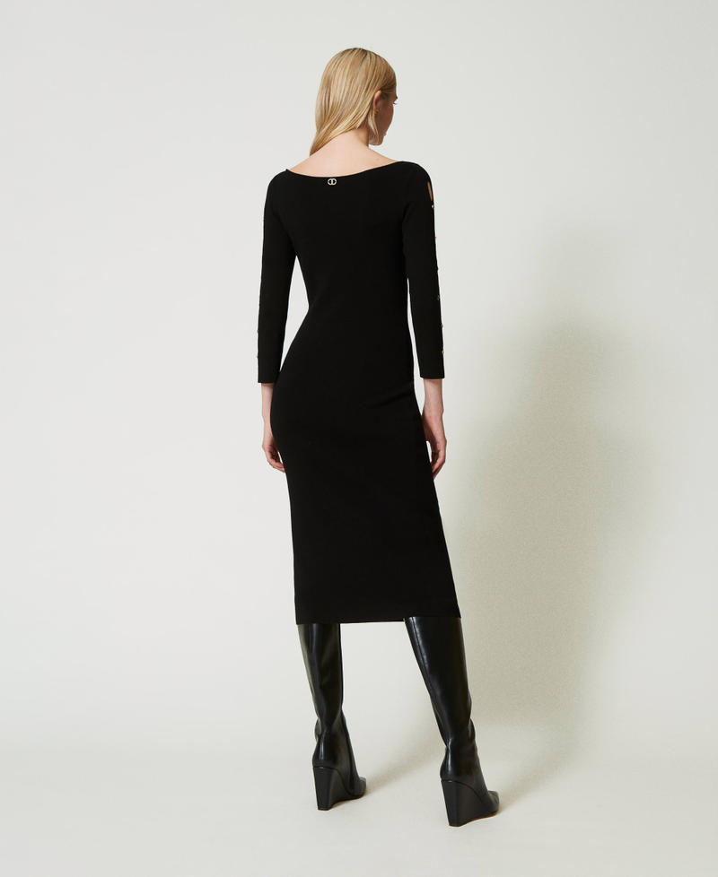 Knit midi dress with cut-outs and studs