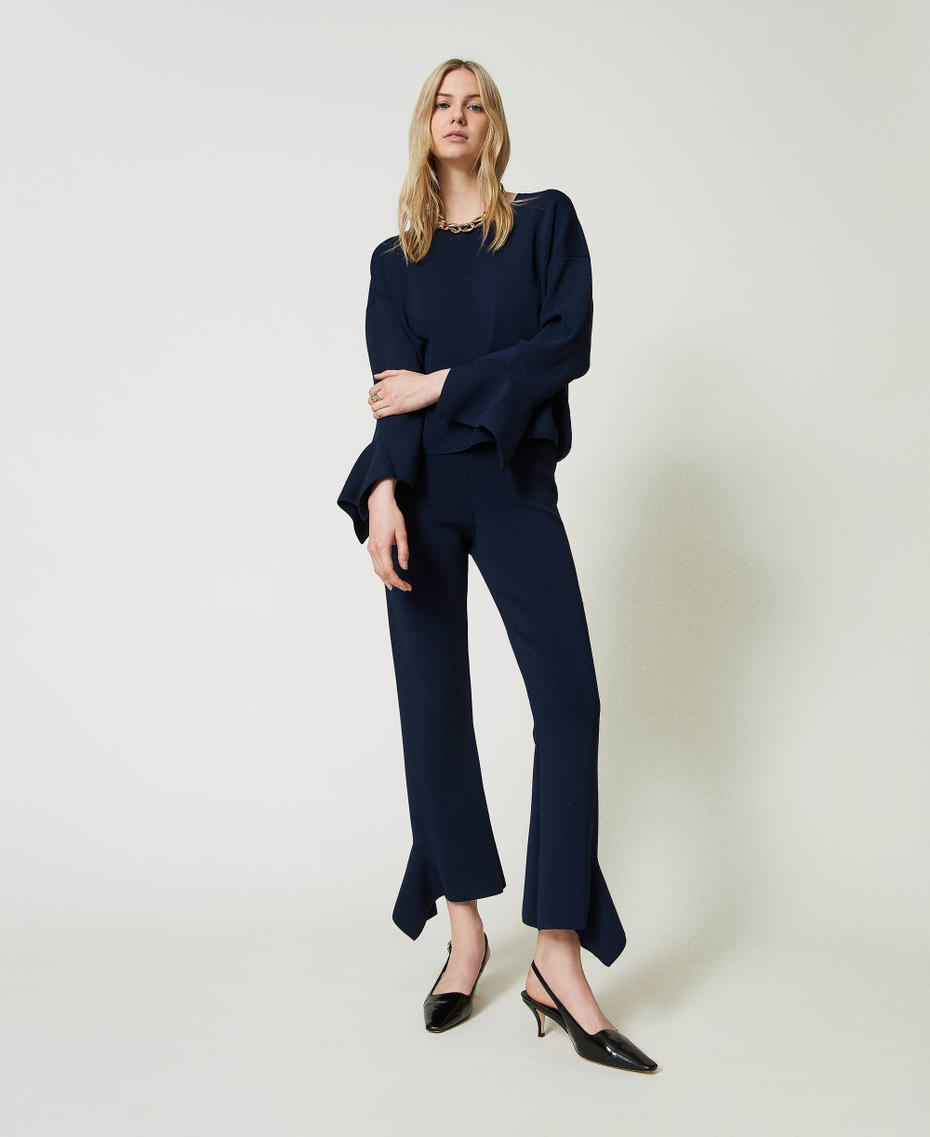 Flared knit trousers with ruffles Indigo Woman 242TP3333_00384_01