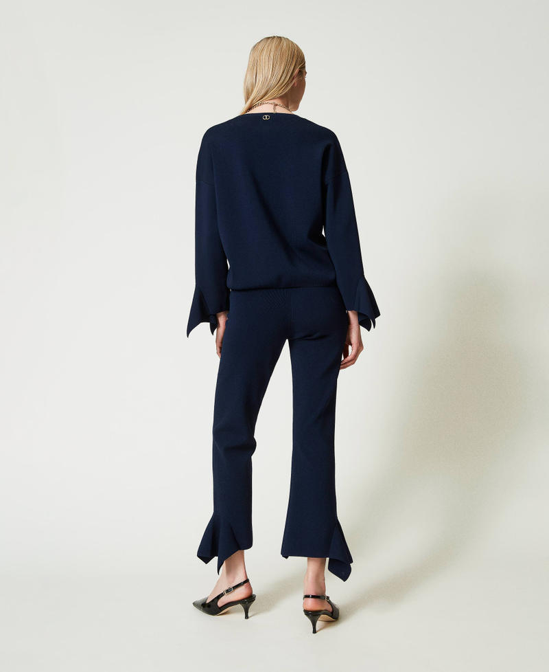 Flared knit trousers with ruffles Indigo Woman 242TP3333_00384_03