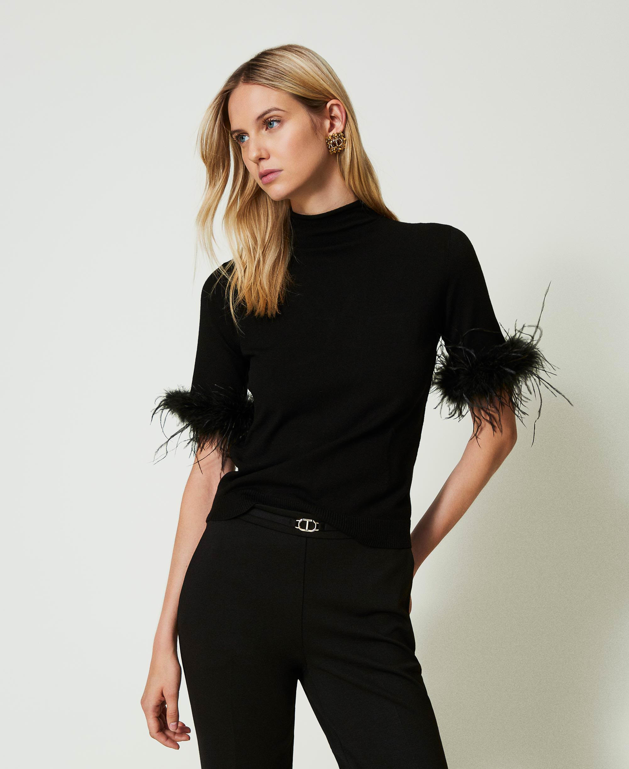 Turtleneck jumper with feathers