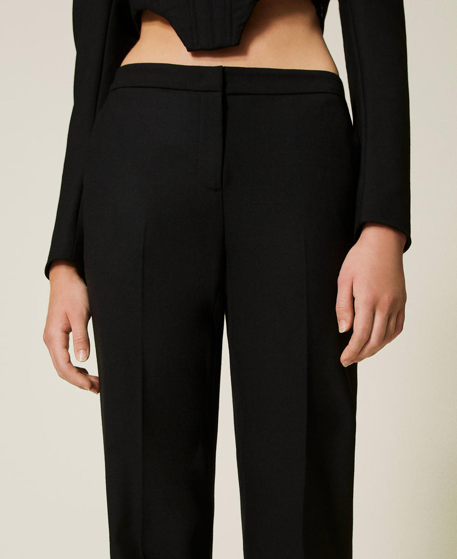 Flared wool blend serge trousers