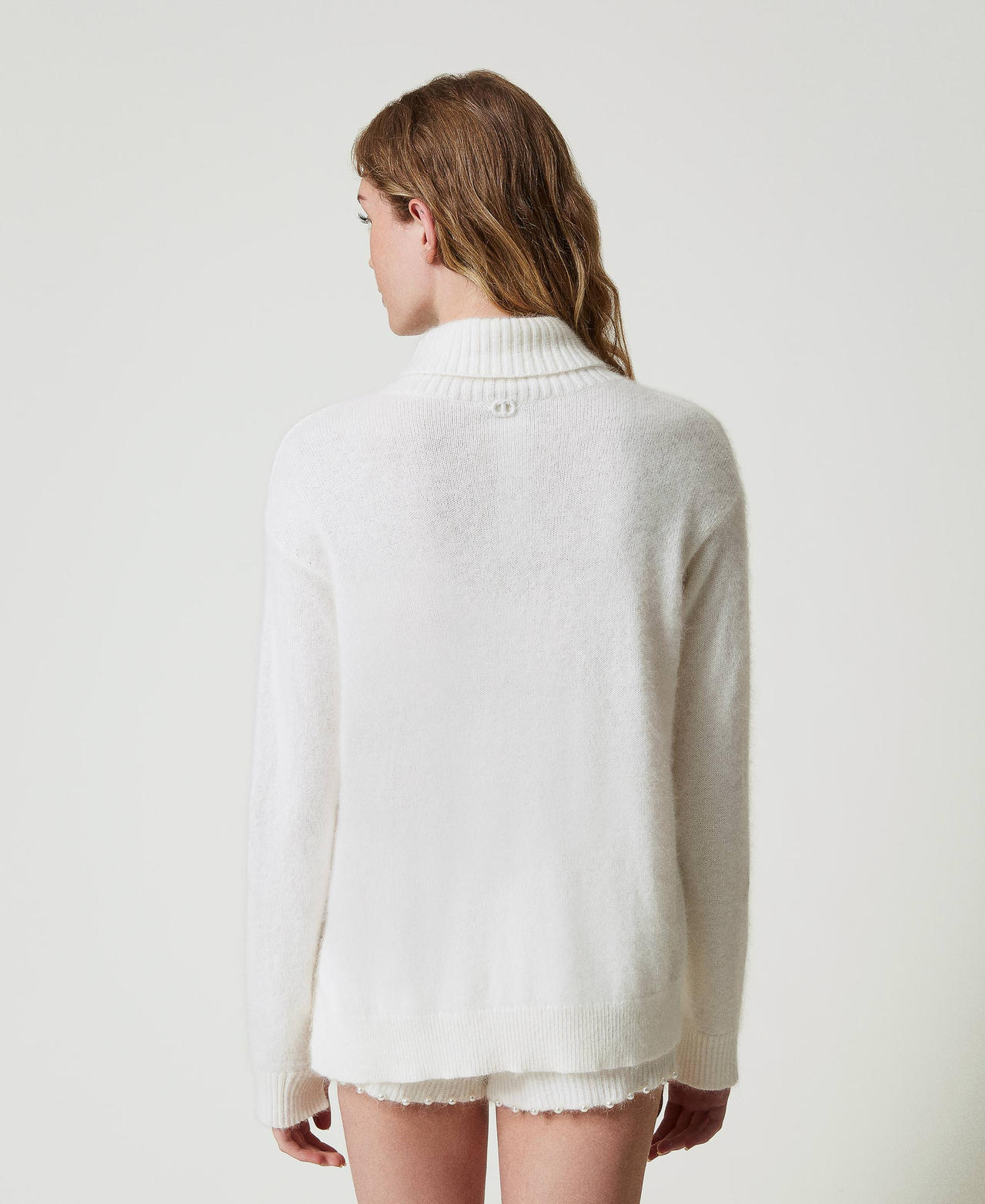 Angora blend turtleneck with pearls