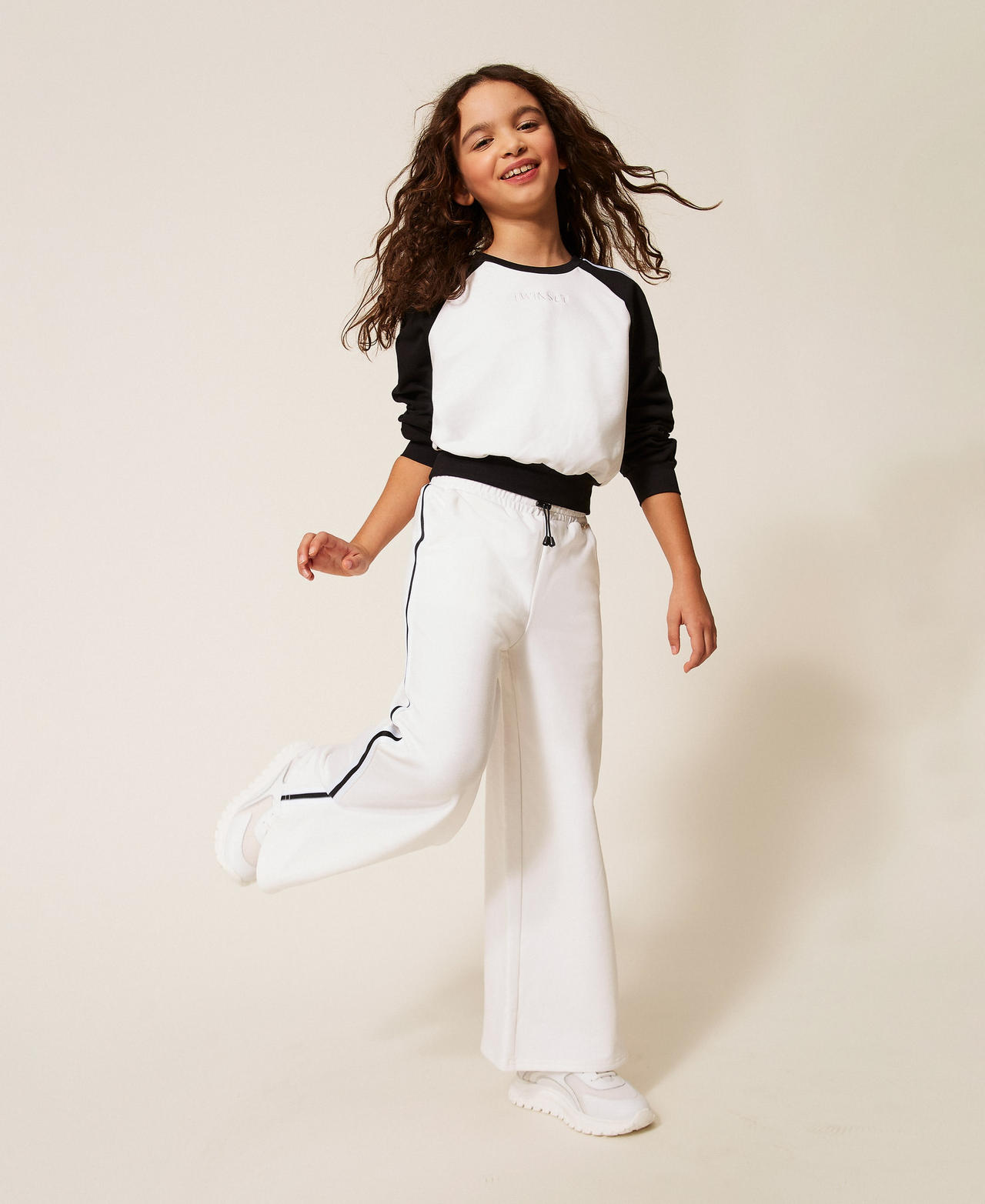 Pantalon ample en molleton avec rayures