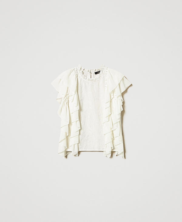 Muslin blouse with ruffles and embroidery