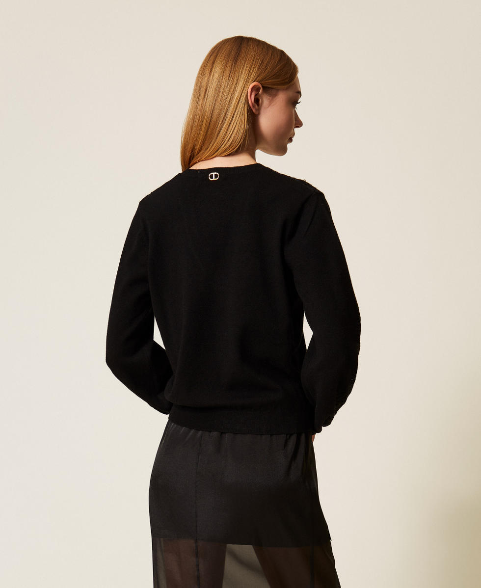 Pullover mit gestickten Intarsien Schwarz Frau 252TT3440_00006_03