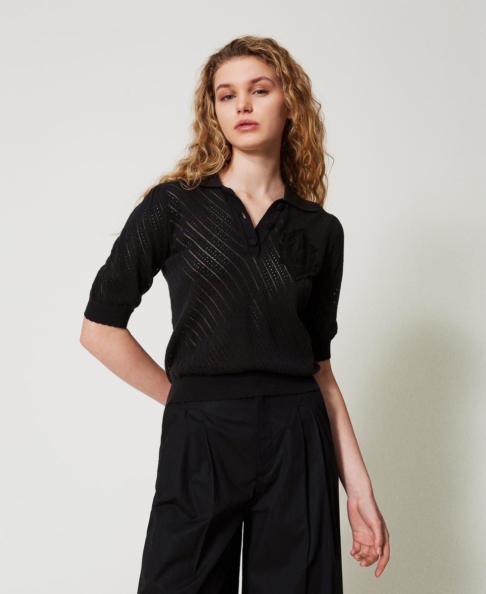 Knit polo shirt with embroidered patch