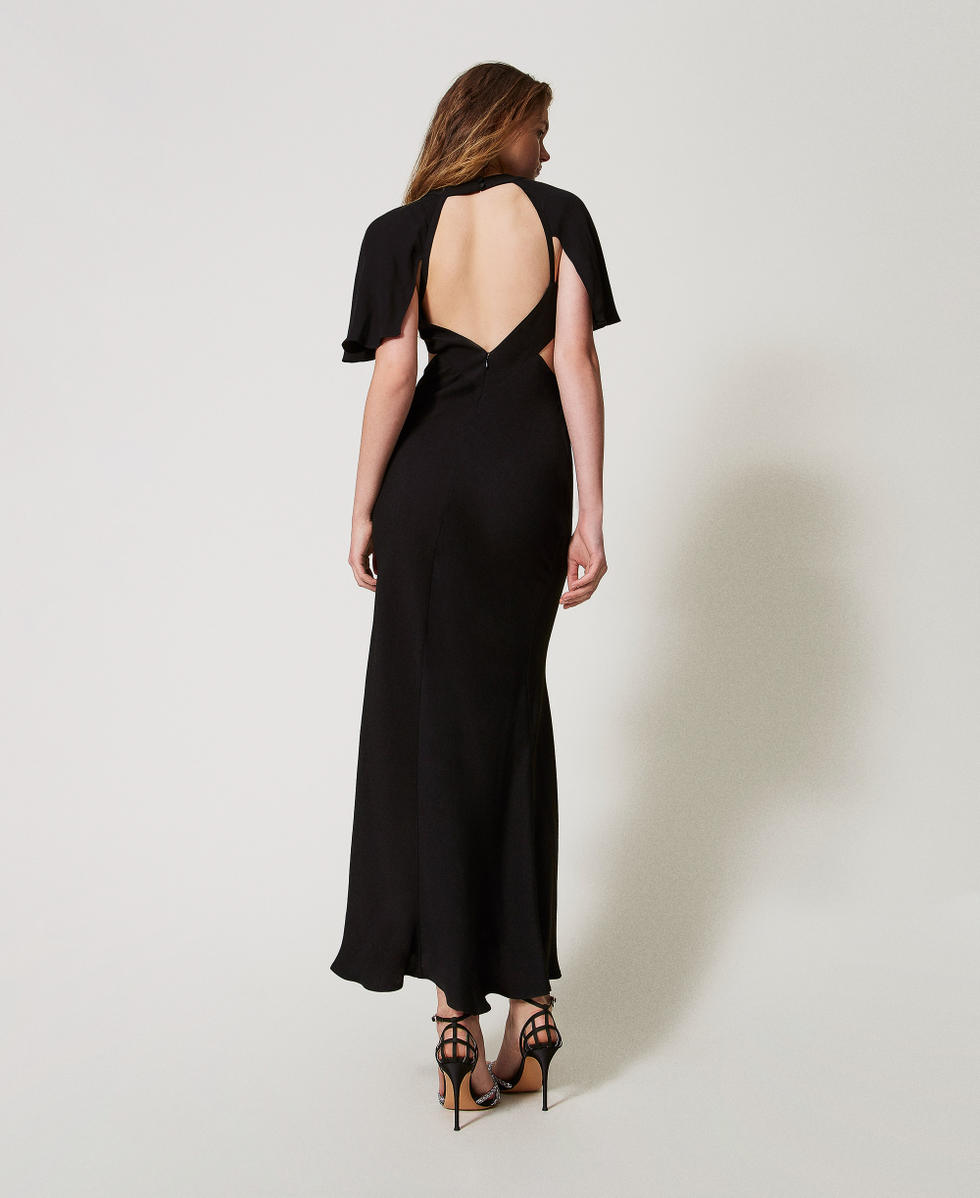 Long dress with cut-outs and an embroidered butterfly Woman