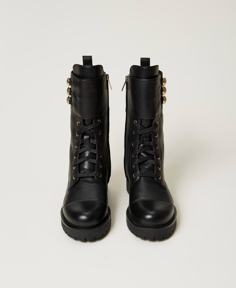 Bottines motardes en cuir avec boutons Noir Femme 251TCP146_00006_04