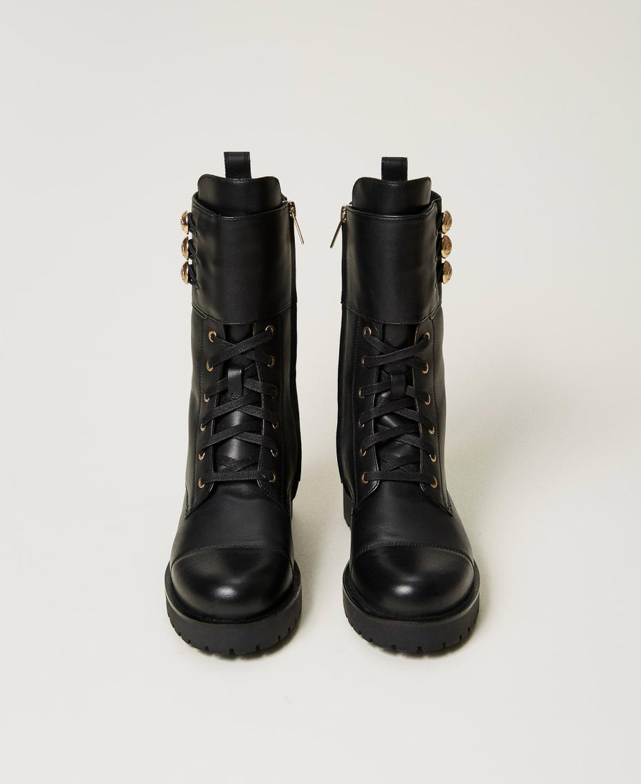 Bottines motardes en cuir avec boutons Noir Femme 251TCP146_00006_04