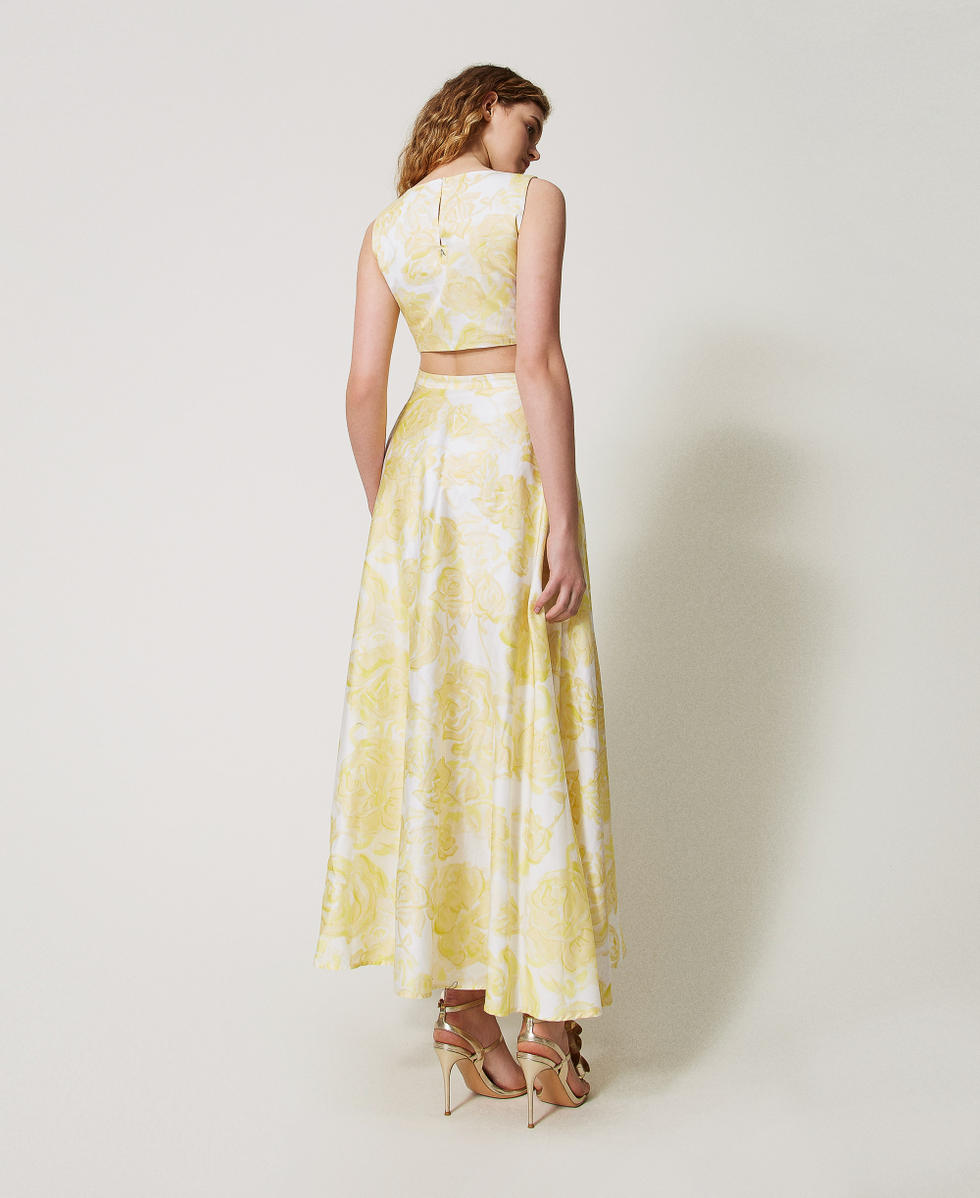 Long printed dress with rose appliqu&eacute;