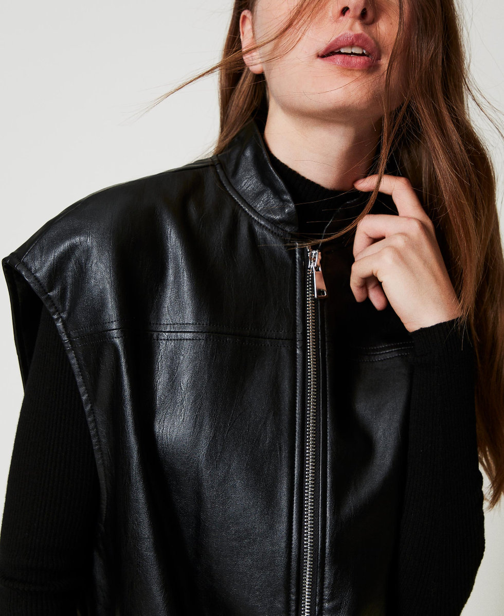 Long faux leather sleeveless jacket