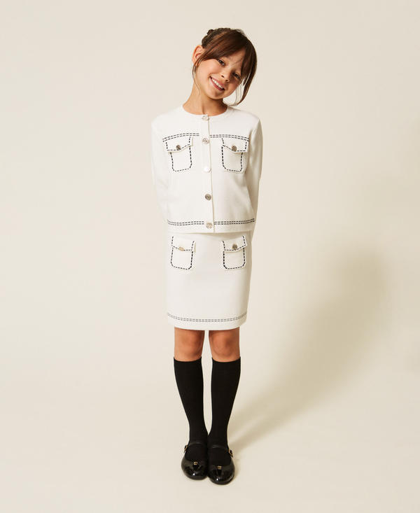 Short knitted skirt with stitching
