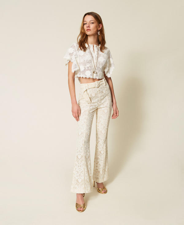 Flared lace trousers with belt