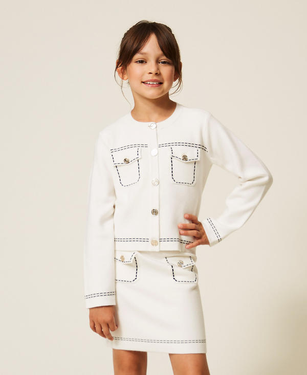 Knitted jacket with stitching