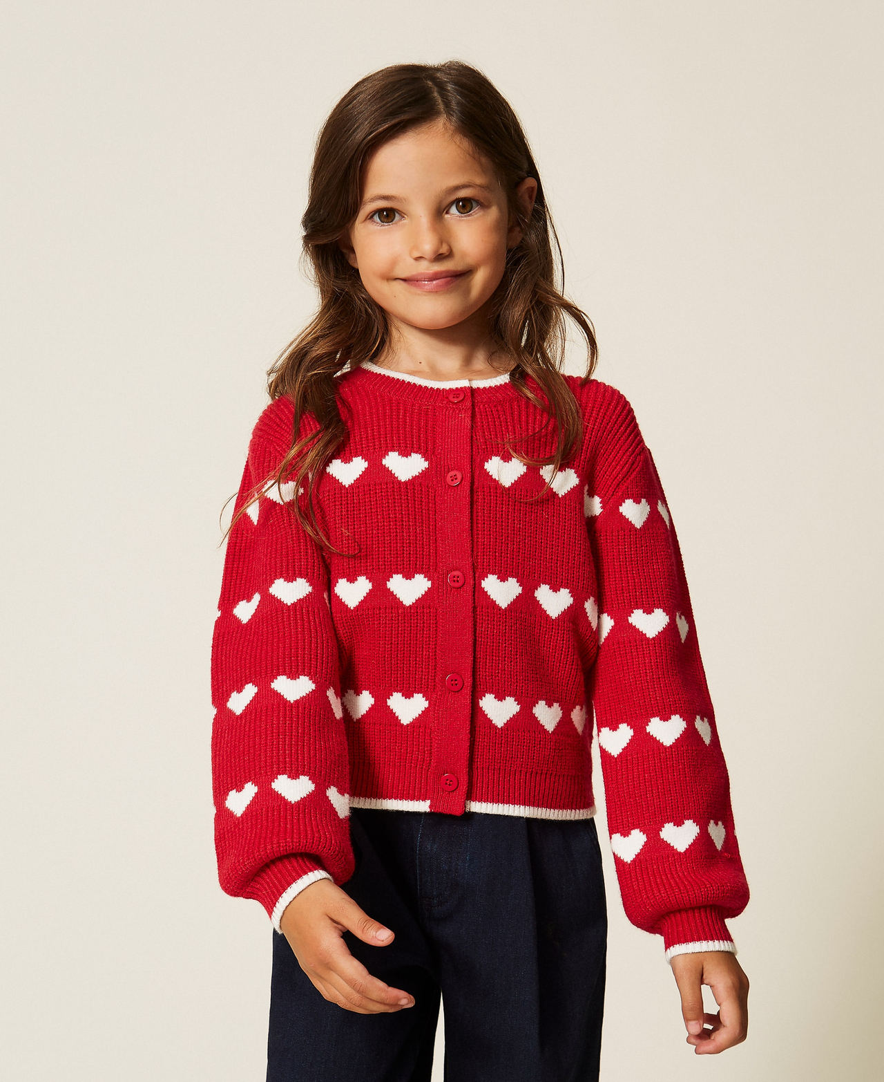 Baby´s cardigan with jacquard heart pattern