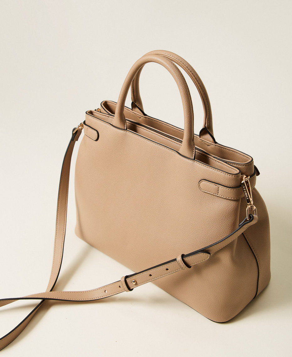 Shopper bag with buckles and shoulder strap