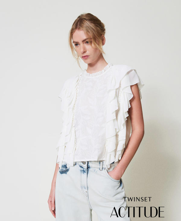 Muslin blouse with ruffles and embroidery
