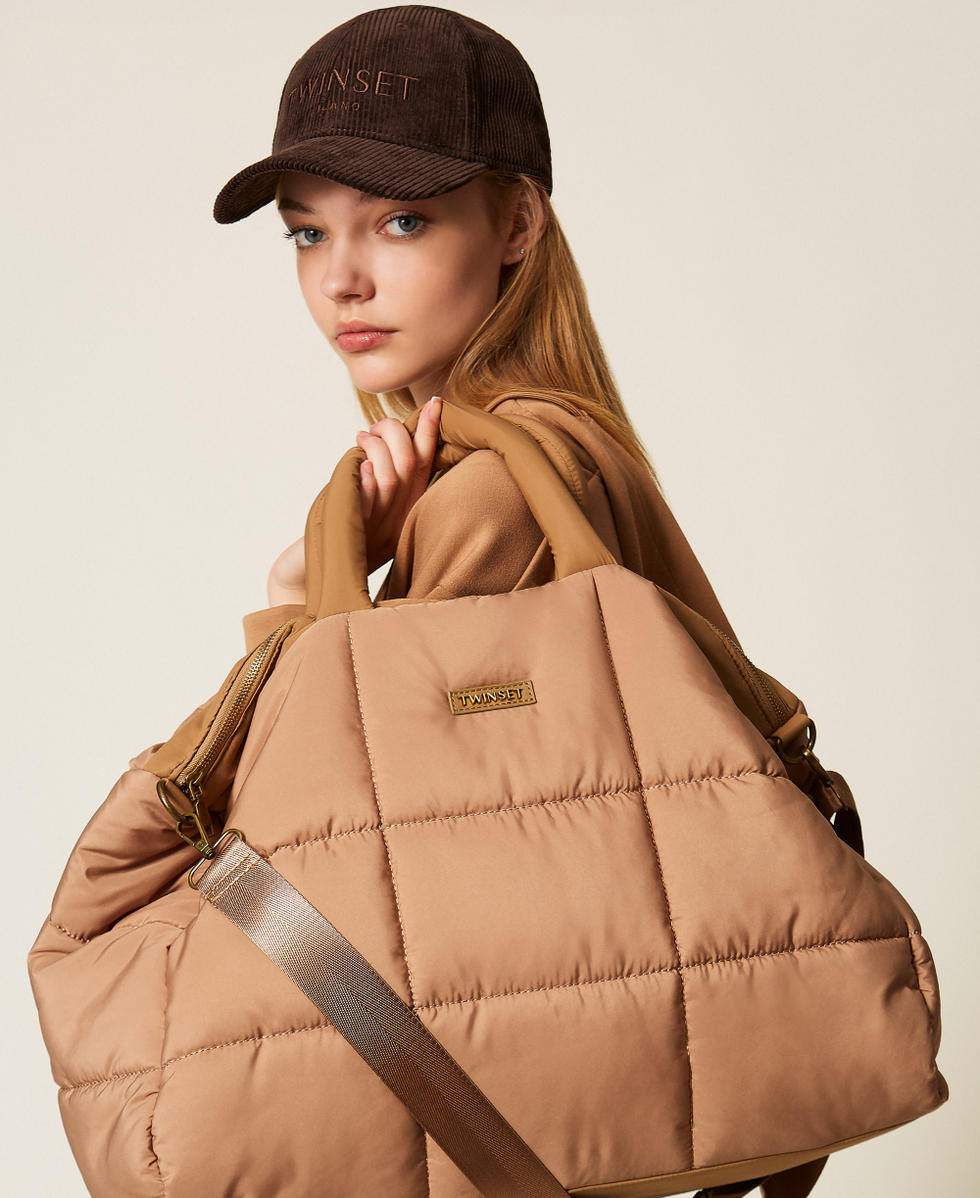 Quilted bag with shoulder strap