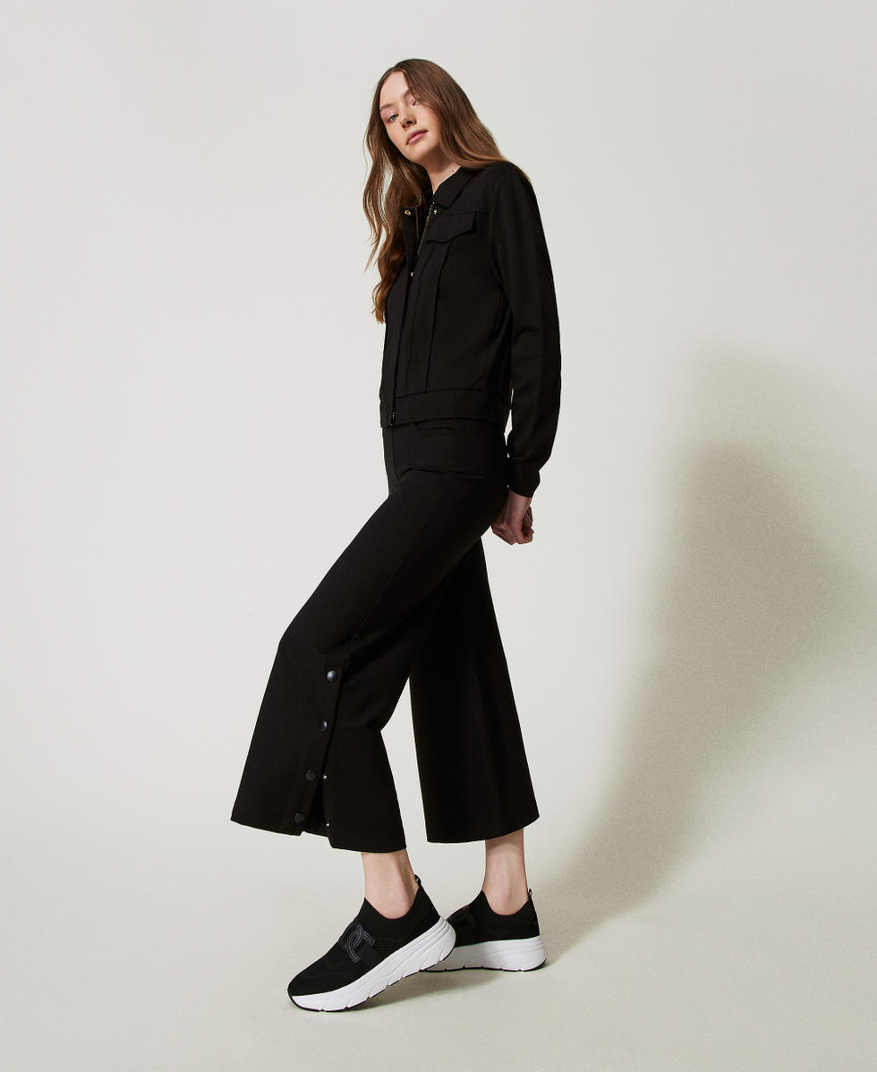 Cropped-Hose mit Schlitzen Schwarz Frau 251LL2RDD_00006_01