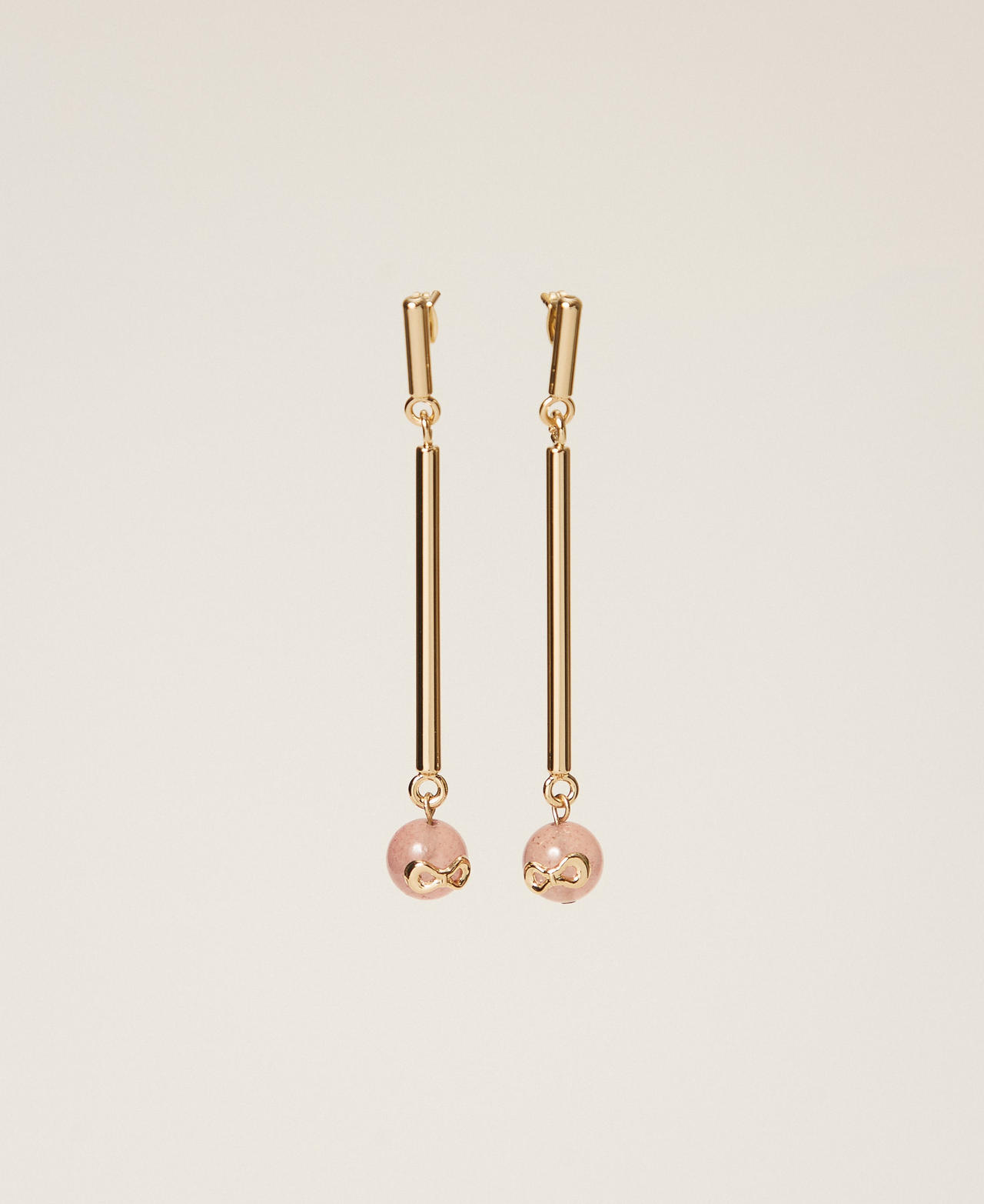 Boucles d&rsquo;oreilles avec pierres et logo