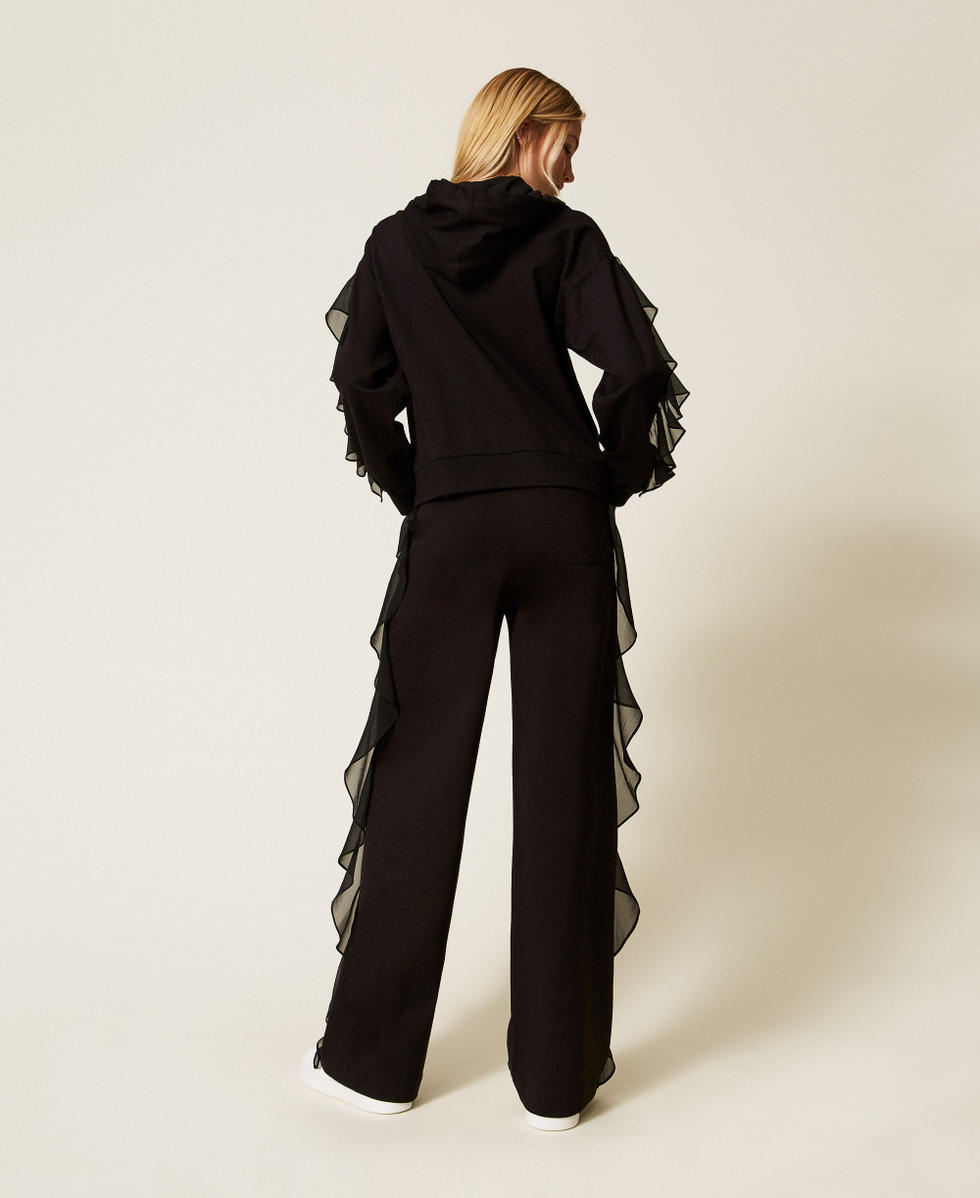 Pantaloni con volant in georgette Nero Donna 252LI2NCC_00006_03