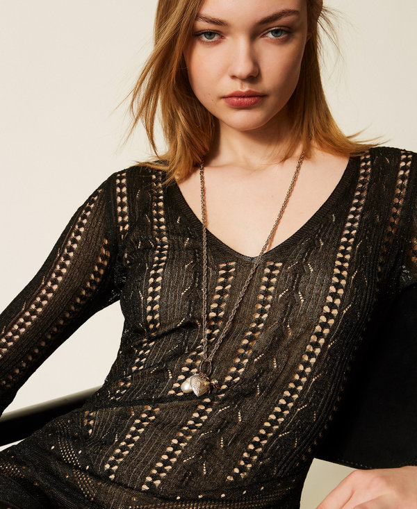 Necklace with charms and pearl