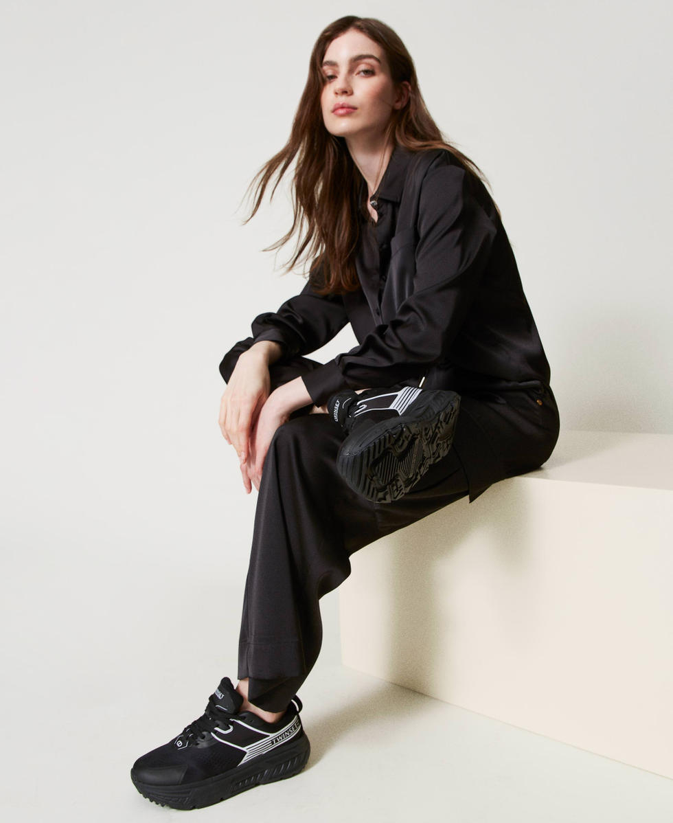 Zapatillas Fessura de rayas con logo a contraste Mujer, Negro