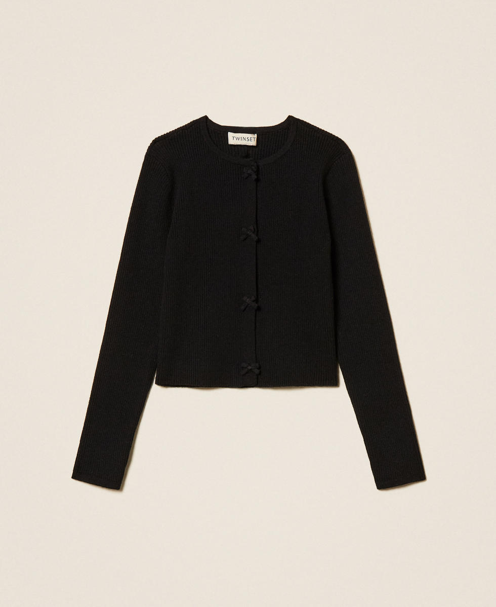 Girls' knitted cardigan with bows