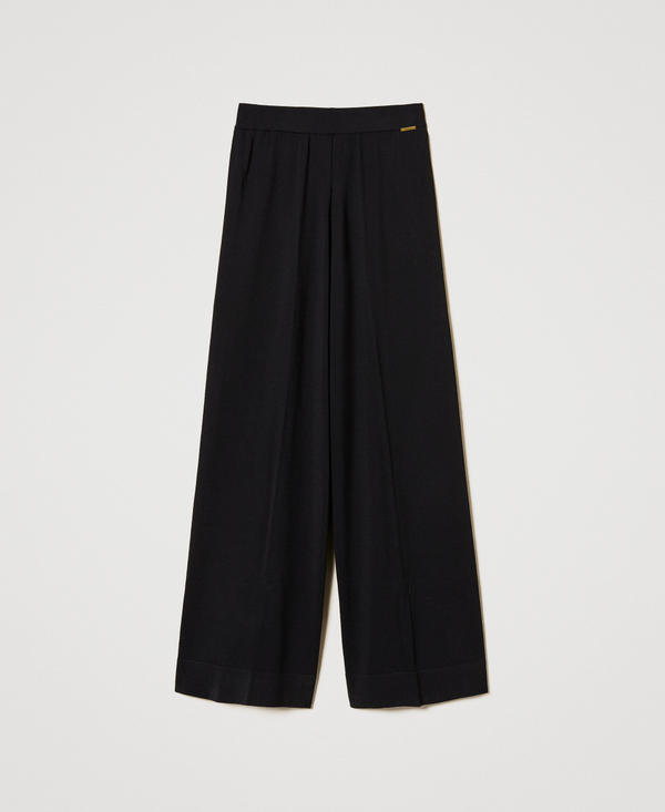 Pantalon en maille avec rayure en lurex