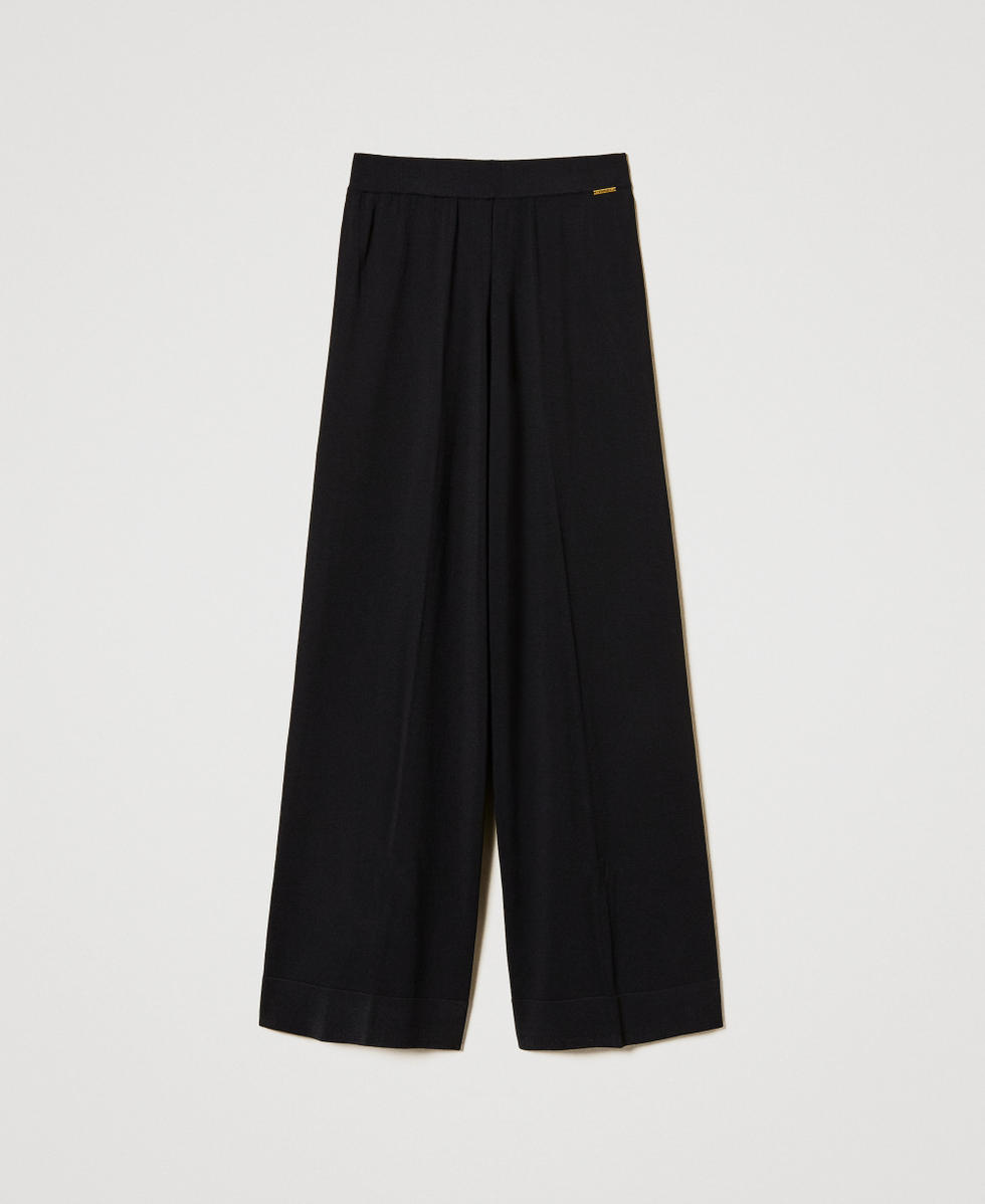 Knit trousers with lurex stripe