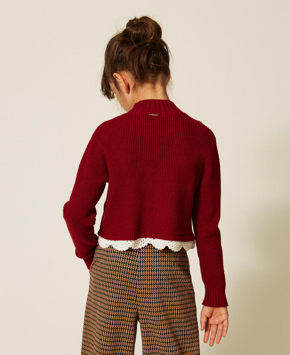 Pull col montant avec crochet