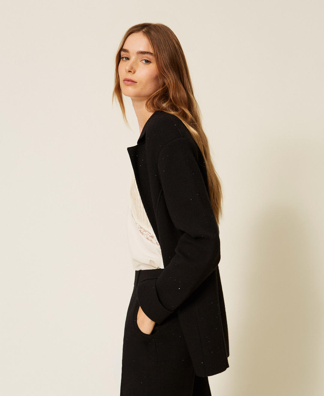 Blazer en maille avec sequins