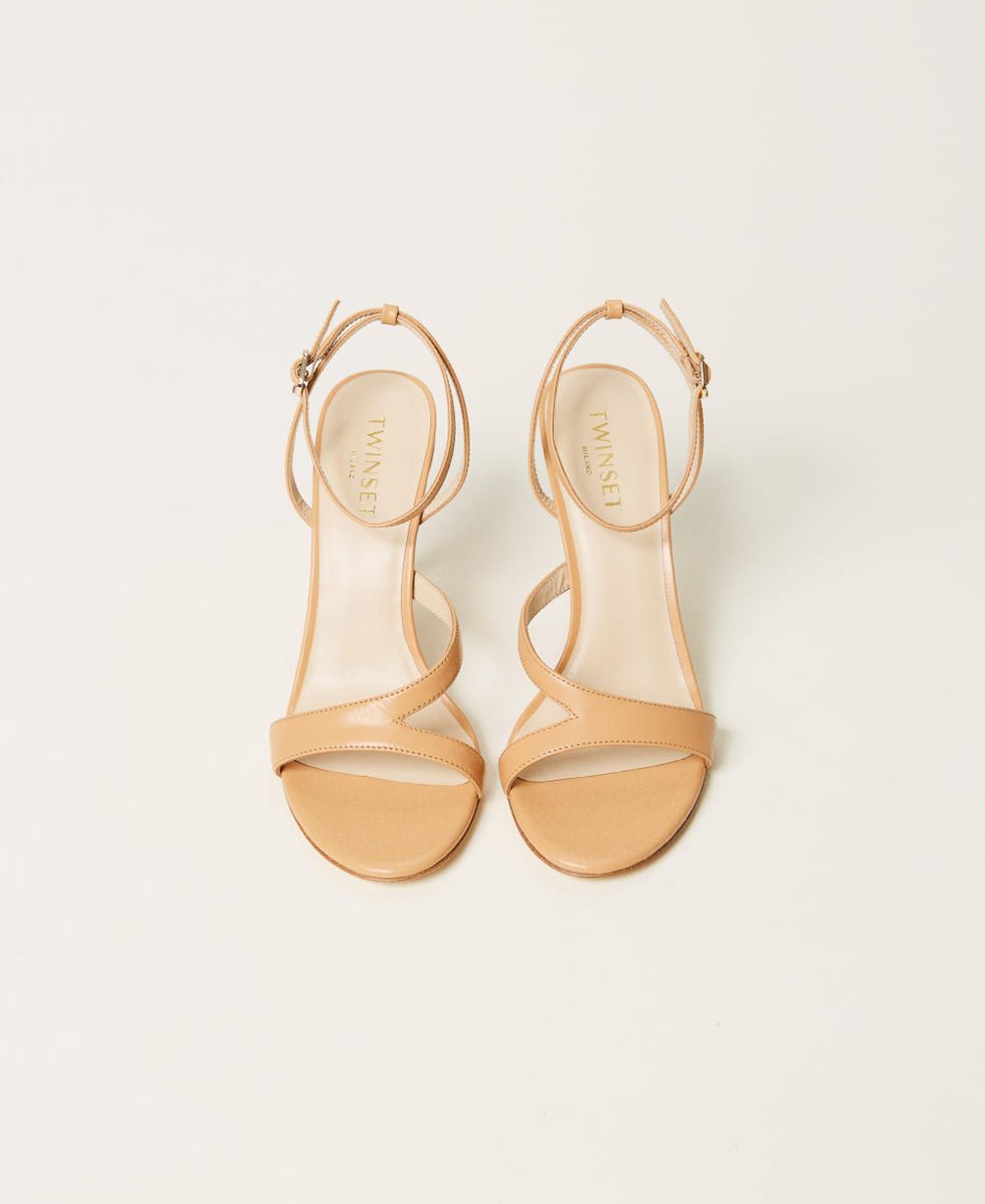 High-heeled leather sandals