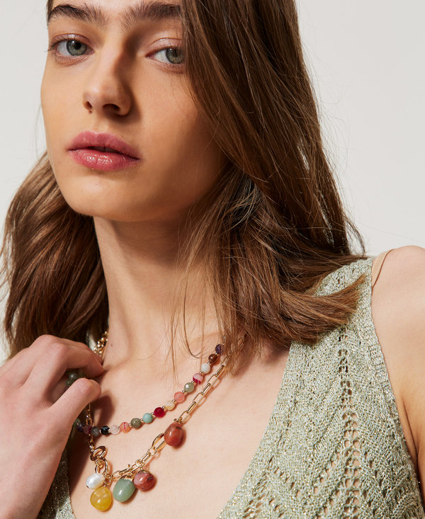 Multi-strand necklace with stones and pendants
