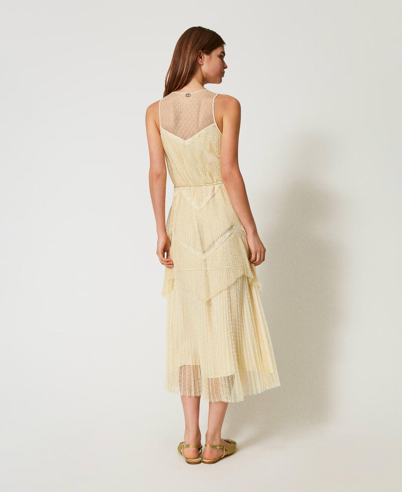 Abito lungo in tulle con balze plissé