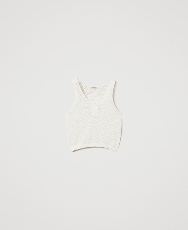 Knit top with embroidered patch